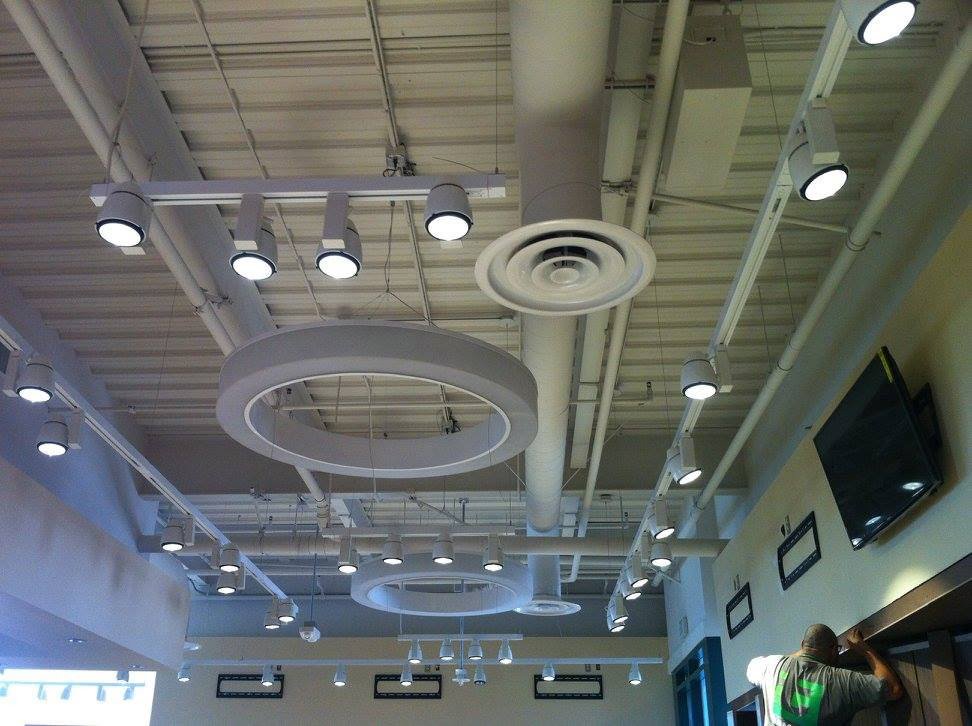 Finished interior ceiling showing HVAC diffusers and exposed ductwork installed by 1st Team Air Conditioning in Anaheim, CA