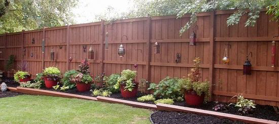 A beautifully finished wooden privacy fence installed by Pokey Fencing & Masonry in Stillwater, OK.