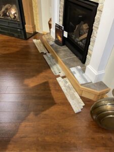 Fireplace hearth with tile samples, showing customization options from Wood Stoves For Sale in Fairbanks, AK.