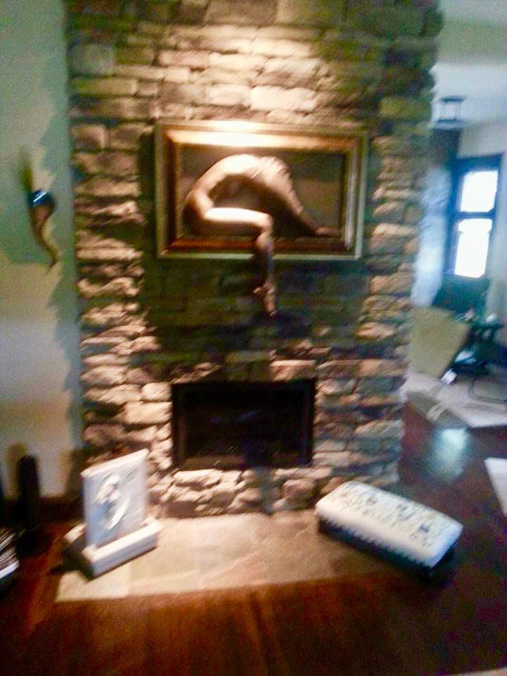 Before and after photos of a fireplace refacing project by Centerville Pipestone Chimney Services LLC in Dayton, OH.