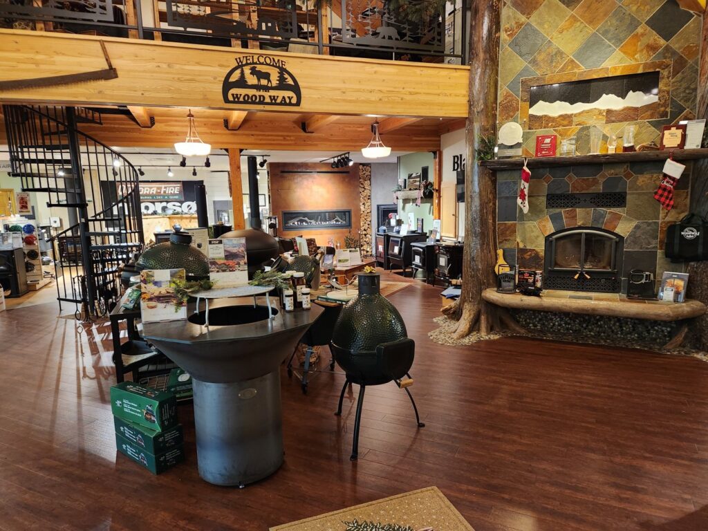 An interior view of the fireplace and wood stove showroom at Wood Stoves For Sale in Fairbanks, AK.