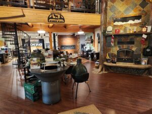 An interior view of the fireplace and wood stove showroom at Wood Stoves For Sale in Fairbanks, AK.