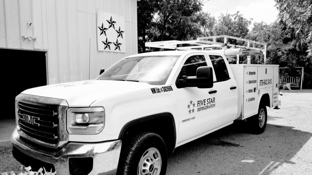 A branded Five Star Refrigeration, LLC HVAC service truck in Las Cruces, NM, ready for heating and air conditioning services.