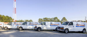 A fleet of Get Steamed Carpet Cleaning, Inc. vans parked, ready for service in North Charleston, SC.