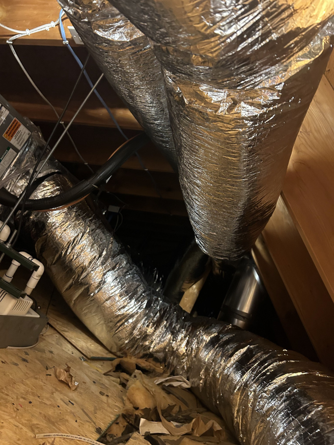 Insulated flexible HVAC ductwork installed in an attic or crawl space by R&R Mechanical Services in Greeley, CO.
