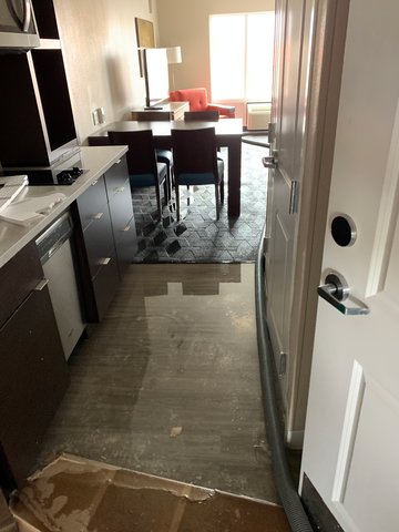 A flooded room requiring water extraction services by Steamway Carpet Cleaning in El Paso, TX