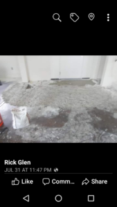 A floor covered in debris from old carpet removal, showing subfloor preparation by Rick's floor covering in Carson City, NV.