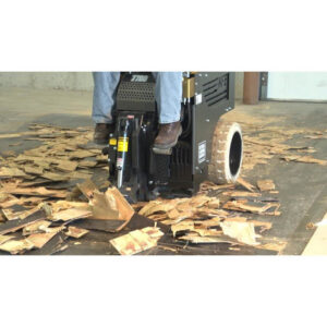 A floor removal machine actively removing old flooring material at a job site for Clean Site Flooring Removal in Sacramento, CA.