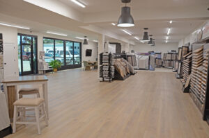 Spacious showroom displaying a wide range of flooring and carpet options at Luke Brothers Flooring in Ankeny, IA.