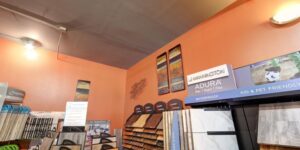 A wide view of the flooring showroom featuring carpet samples at Home 360 Flooring Company in Columbus, NE.