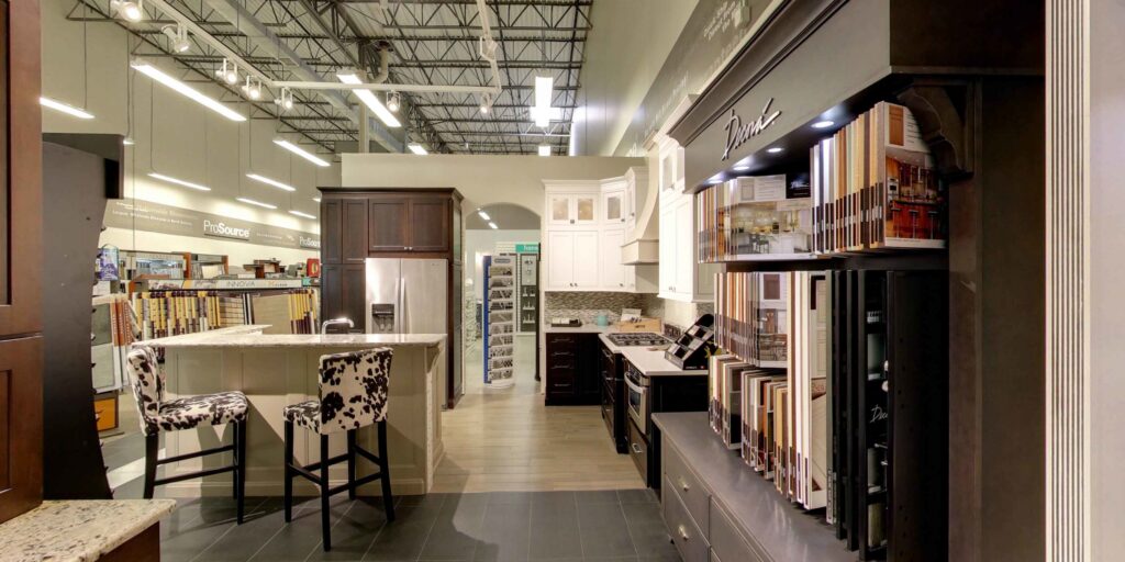 Interior view of the ProSource Flooring Kitchen & Bath showroom in Naperville, IL, showcasing various flooring displays.