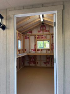 Fluorescent light fixture installed on the ceiling of a shed by Andrew's Electric in Kent, WA