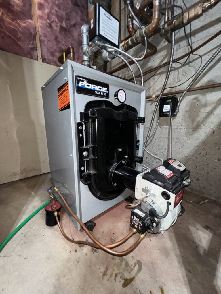 A large Force Boiler unit installed, with a Cummings Inc. sticker, by Cummings Inc. in Puyallup, WA.