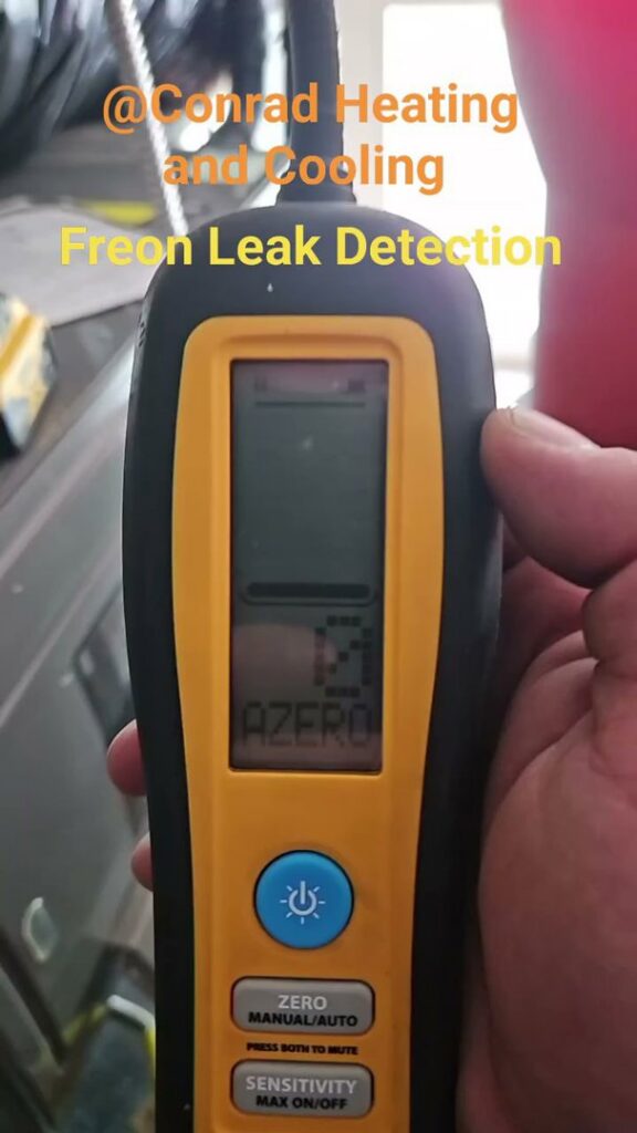 A freon leak detection tool being used for HVAC service by Conrad Heating and Cooling in Beaverton, OR.