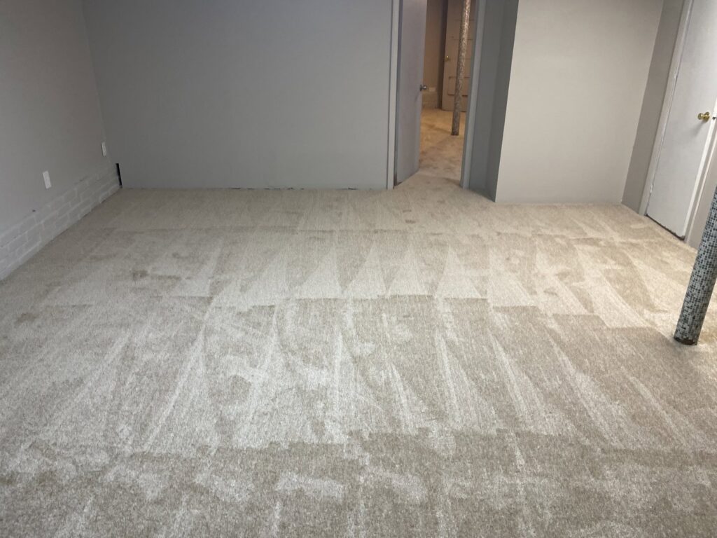 A freshly carpeted room showcasing professional installation by JJS Flooring & Decorating Co Inc in Saint Louis, MO.