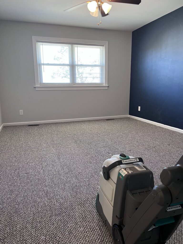 A freshly cleaned light-colored bedroom carpet with visible cleaning lines by Hampton Carpet Cleaning Pros in Hampton, VA.