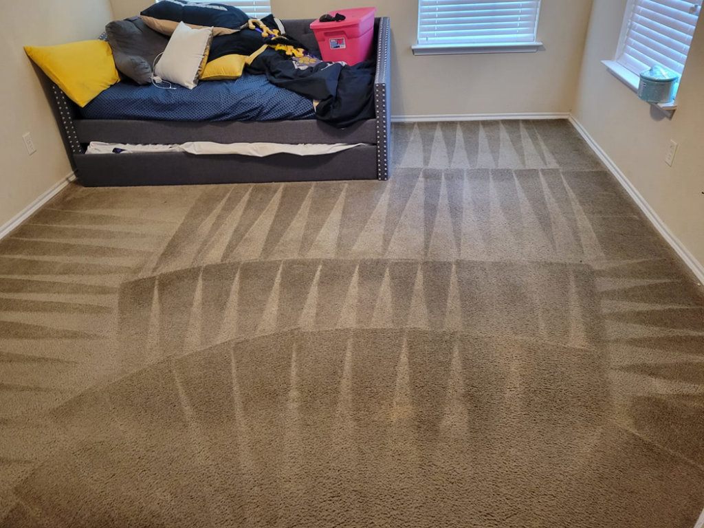 A freshly cleaned carpet with distinct patterns in a bedroom by Best Carpet Cleaning in Dallas, TX.