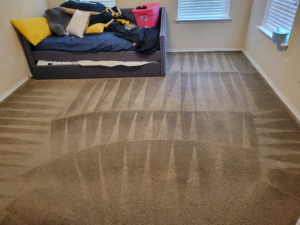 A freshly cleaned carpet with distinct patterns in a bedroom by Best Carpet Cleaning in Dallas, TX.