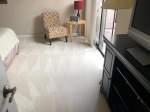 Freshly cleaned carpet in a bright bedroom by Cleaning Service Pro, LLC in Peoria, AZ