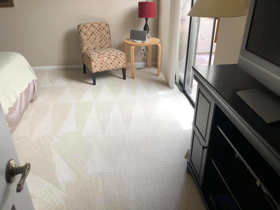 Freshly cleaned carpet in a bright bedroom by Cleaning Service Pro, LLC in Peoria, AZ