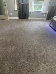 A freshly cleaned carpet in a bedroom, showcasing the results from Nashville Carpet Cleaning in Madison, TN.