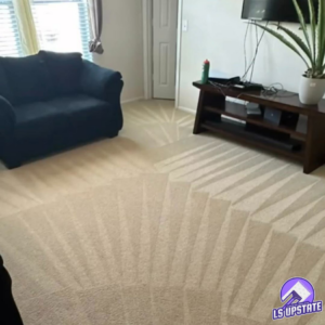 A freshly cleaned carpet with distinct vacuum lines in a living room by LS Upstate Cleaning in Greenville, SC.