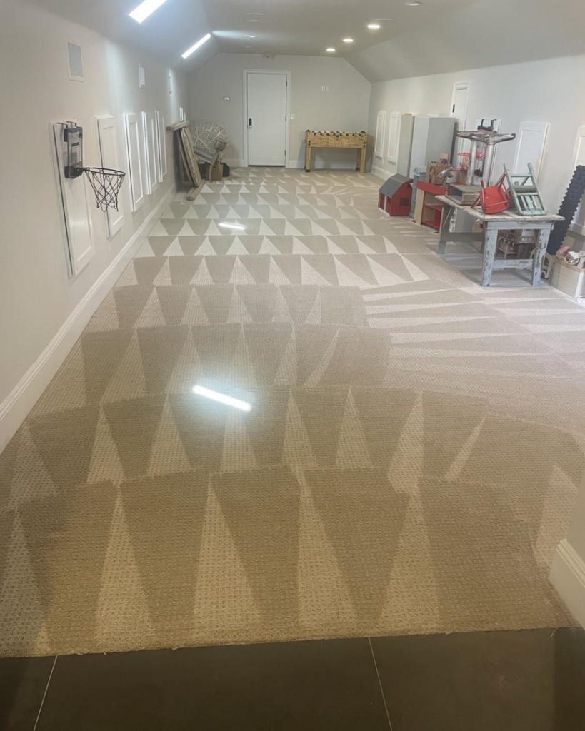 Freshly cleaned carpet showing distinct patterns from the cleaning process by Evolution Carpet Cleaning in Fresno, CA