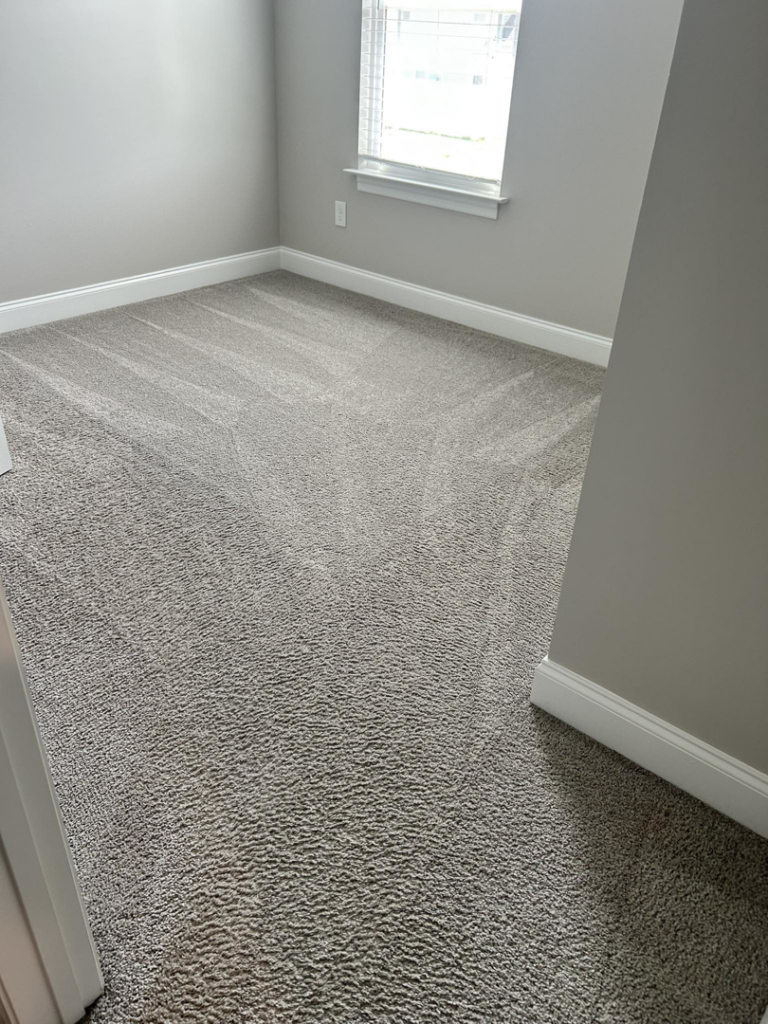 A freshly cleaned and groomed carpet in a residential room by The Gold Standard Professional Cleaning Services, LLC in Murfreesboro, TN
