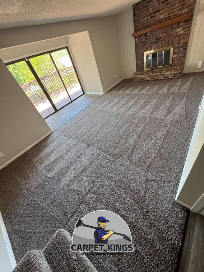 A freshly cleaned carpet showing distinct vacuum lines after service by Carpet Kings Cleaning & Restoration in Olathe, KS.