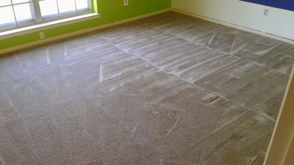 A freshly cleaned carpet showing distinct vacuum lines after service by KCclean in Arlington, TX