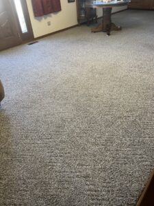 A freshly cleaned carpeted room, showcasing professional results from The Cleaning Connection in Saint Joseph, MO.