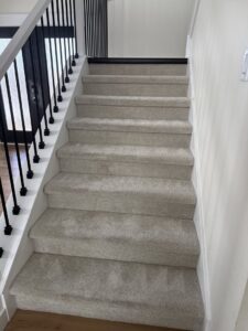 Freshly cleaned light-colored carpeted stairs by Klein Chem-Dry in Cedar Rapids, IA.