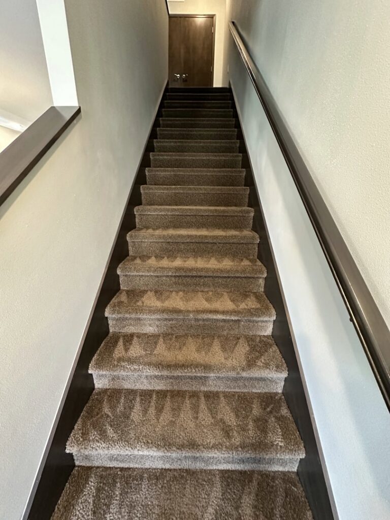 Freshly cleaned carpeted stairs leading upstairs by Klein Chem-Dry in Cedar Rapids, IA.