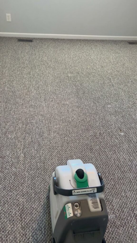 A freshly cleaned grey carpeted staircase after professional service by Hampton Carpet Cleaning Pros in Hampton, VA.