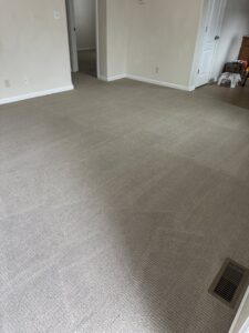 A freshly cleaned or installed carpet in a residential room by Two Sheas Restoration in Tulsa, OK.