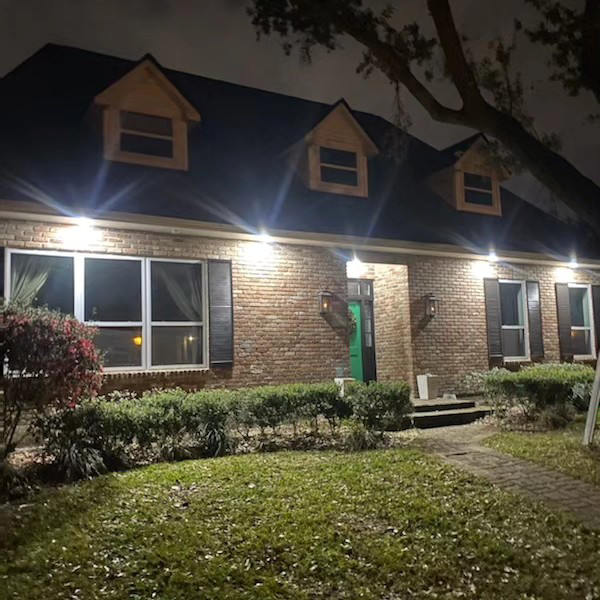 Front of house lighting installation showcasing bright illumination by Light of the World Electric in Lake City, FL.