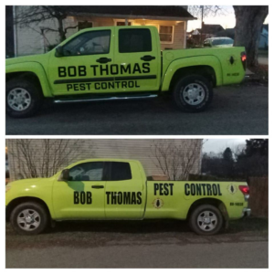 The front of a Bob Thomas Pest Control truck with a bug logo on the hood in Latrobe, PA.