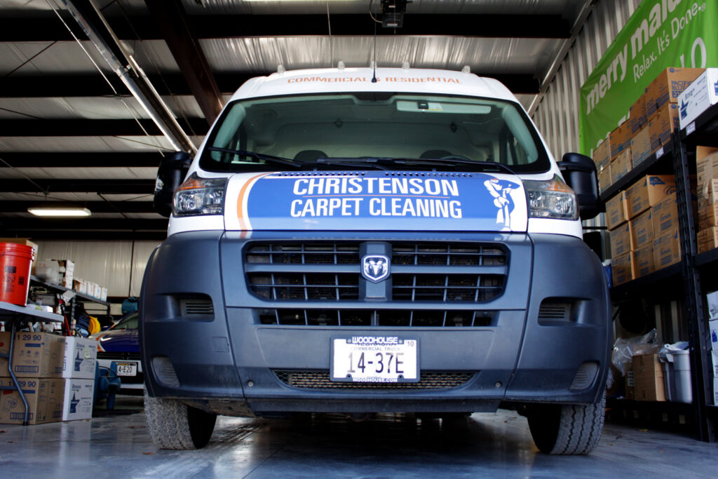 Front view of a Christenson Carpet Cleaning & Restoration service van in Hastings, NE, ready for a job.