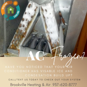 A frozen AC coil with ice and condensation, indicating a repair need from Brookville Heating & Air Conditioning in Dayton, OH.