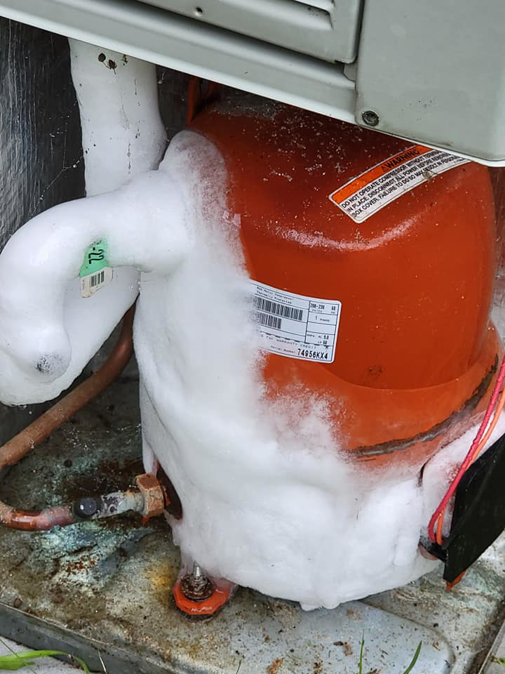 A frozen HVAC compressor unit requiring repair service from HD Mechanical Services in Buena Park, CA
