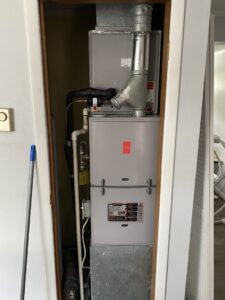A Fujitsu furnace and air handler unit with ductwork installed by Riccardi Heating and Air in Toms River, NJ.