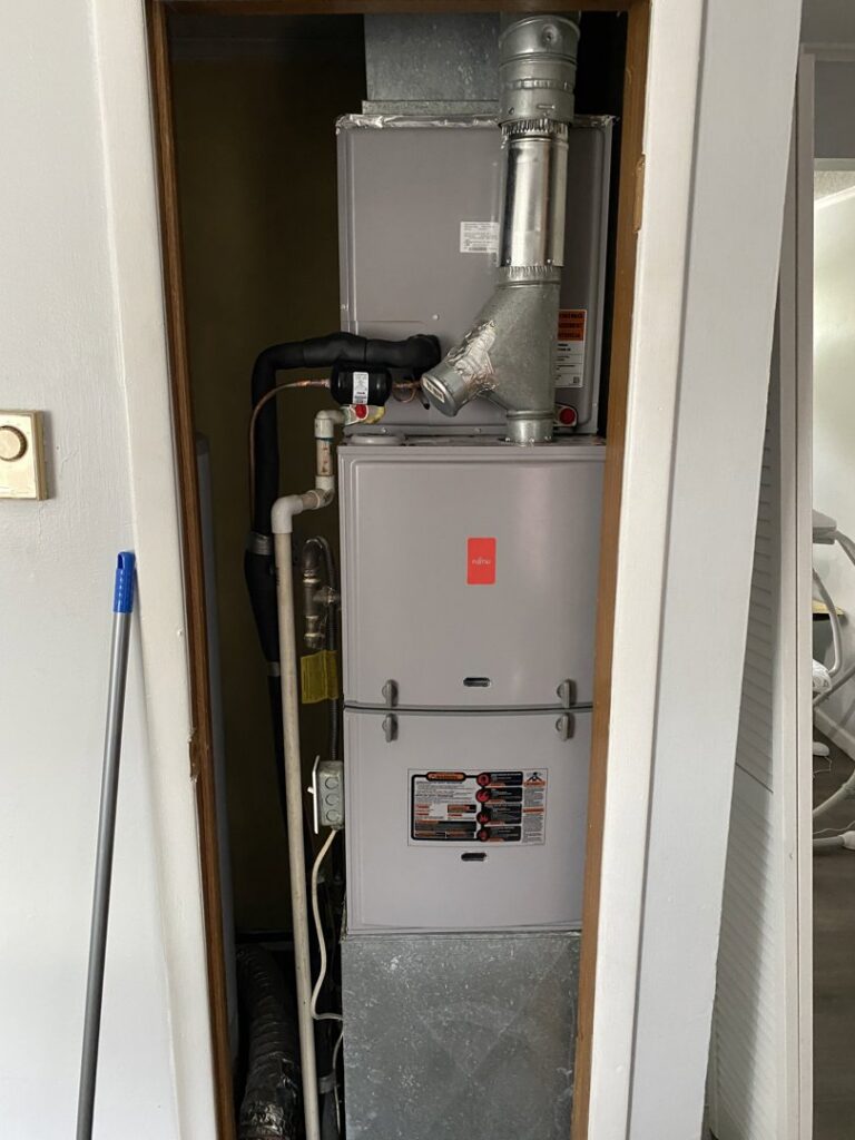A Fujitsu furnace and air handler unit with ductwork installed by Riccardi Heating and Air in Toms River, NJ.