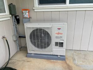 A new Fujitsu Halcyon Inverter outdoor HVAC unit installed by Air Masters, Inc. in Port Orchard, WA.