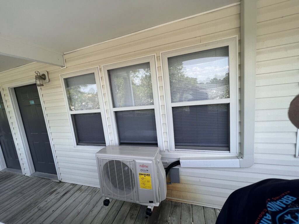 A newly installed Fujitsu mini-split outdoor unit by Brand Air Heating and Cooling LLC in Wilmington, NC.