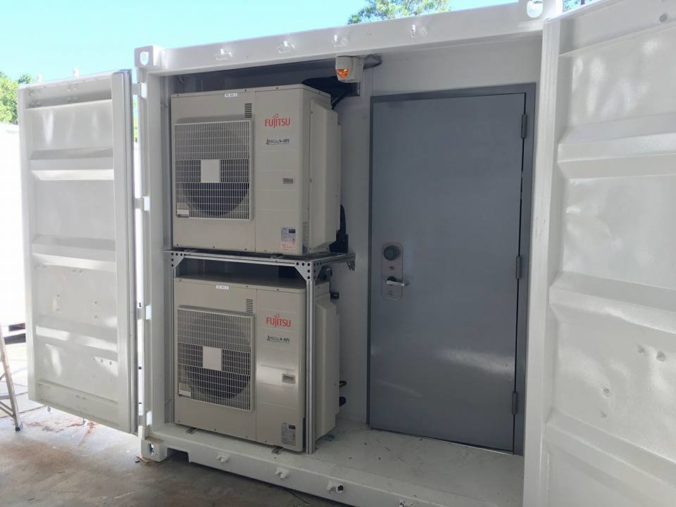 Two Fujitsu outdoor HVAC units installed inside a container by TEMCO of Gulf Coast Inc. in Biloxi, MS.