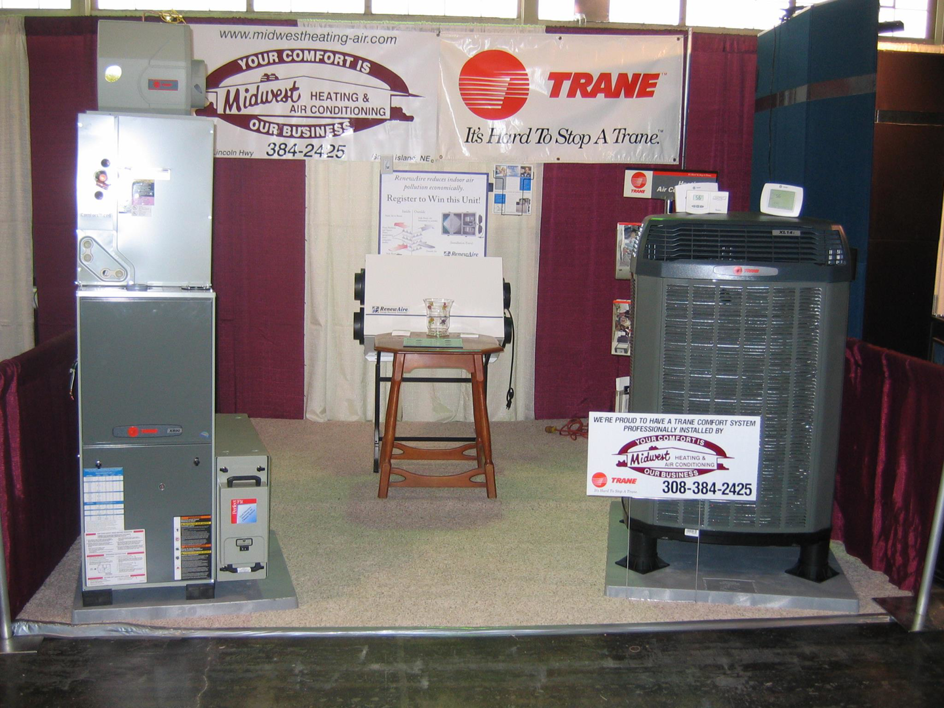 An indoor furnace and outdoor air conditioning unit on display by Midwest Heating & Air Conditioning in Grand Island, NE.