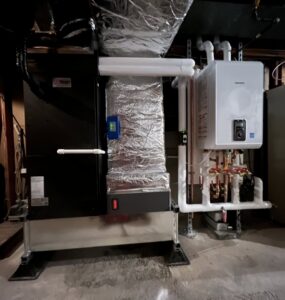 A furnace and air handler unit installed in a residential basement by Dane HVAC in Willowbrook, IL.