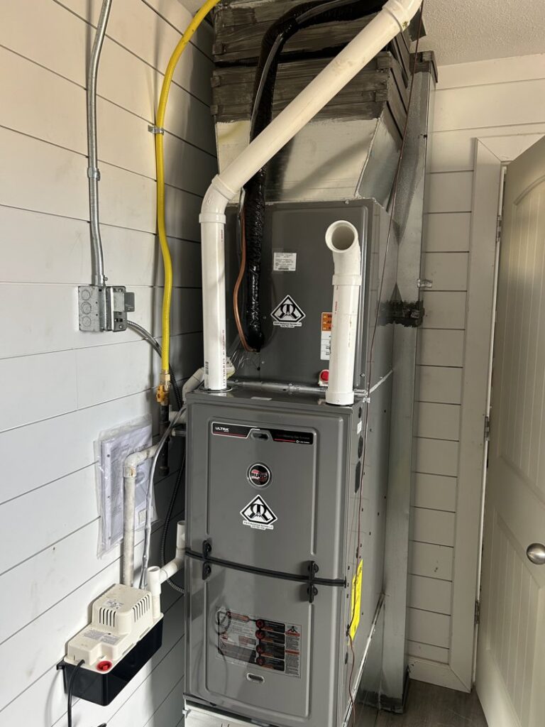 A new furnace and air handler unit with ductwork installed by R&R Mechanical Services in Greeley, CO.