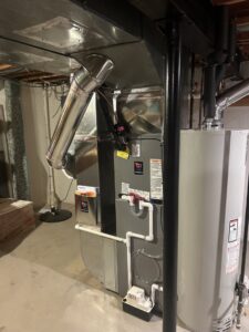 A furnace, air handler, and water heater installation by Controlled Weather HVAC in Shelby Township, MI.