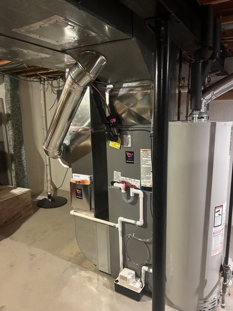 A furnace, air handler, and water heater installation by Controlled Weather HVAC in Shelby Township, MI.